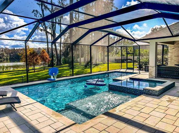 Crystal clear Florida pool maintained by Pro Clean Pools